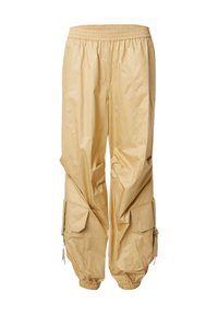 Lichtbeige cargobroek gemaakt van een soepele, lichte stof. Beschikt over een elastische tailleband, meerdere zijzakken en elastische manchetten.