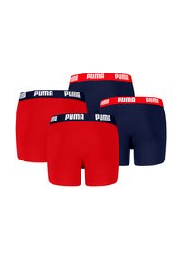 Das PUMA Boxershorts-Set umfasst zwei rote und zwei marineblaue Paare. Jedes hat einen kontrastierenden elastischen Bund mit "PUMA"-Branding.
