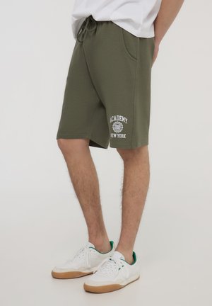 - Spodnie treningowe