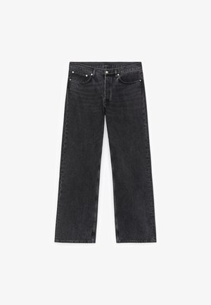 Sorte denimjeans med vidt ben, der har forlommer, knaplukning og subtil falmning i stoftekstueren.
