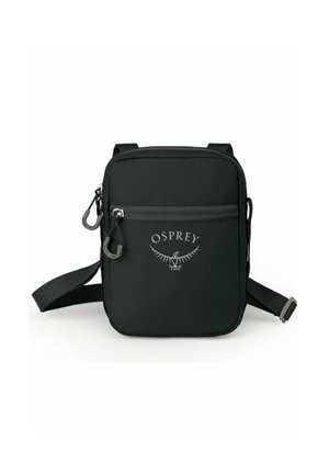 Pequeña bolsa bandolera negra con bolsillo frontal con cremallera, correa ajustable y logo de Osprey en el frente, mostrada sobre fondo blanco.
