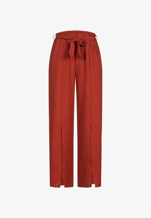 Laiene jalad rusti värvi püksid, millel on reguleeritav vöökoht, kaks külgavaust ja kerge, tekstuuriga kangas.