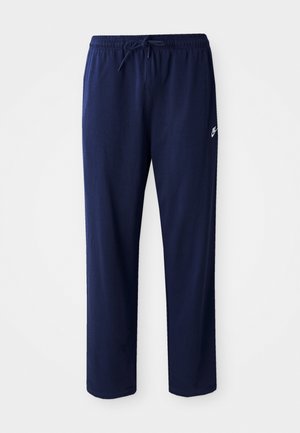 Pantalons de jogging légers bleu marine en tissu mélangé coton. Dotés d'une taille élastique avec cordon de serrage et d'un petit logo sur le côté gauche.