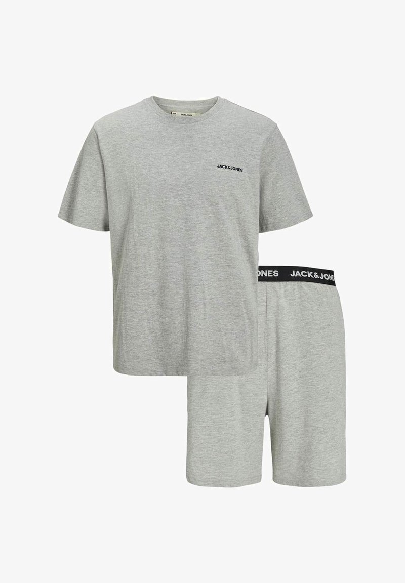 Grey cotton loungewear set includes a short-sleeve t-shirt and shorts. T-shirt features a black logo; shorts have a black waistband.