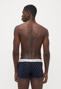 Tommy Hilfiger TRUNK PRINT 7 PACK - Calzoncillos - print/laz blue/green/red/blue