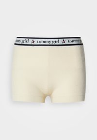 Blanding af bomuldsdrengshorts i cremefarve med ribbet tekstur og en bred talje, der har "tommy girl" logo og røde stjerneaccenter.