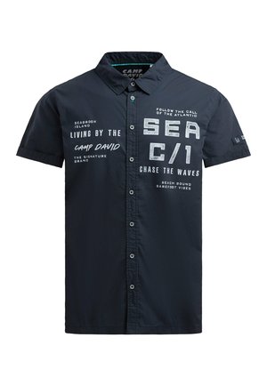 Navy short-sleeve button-up shirt with white printed text about the sea, waves, and the brand "Camp David" on front and sleeve.