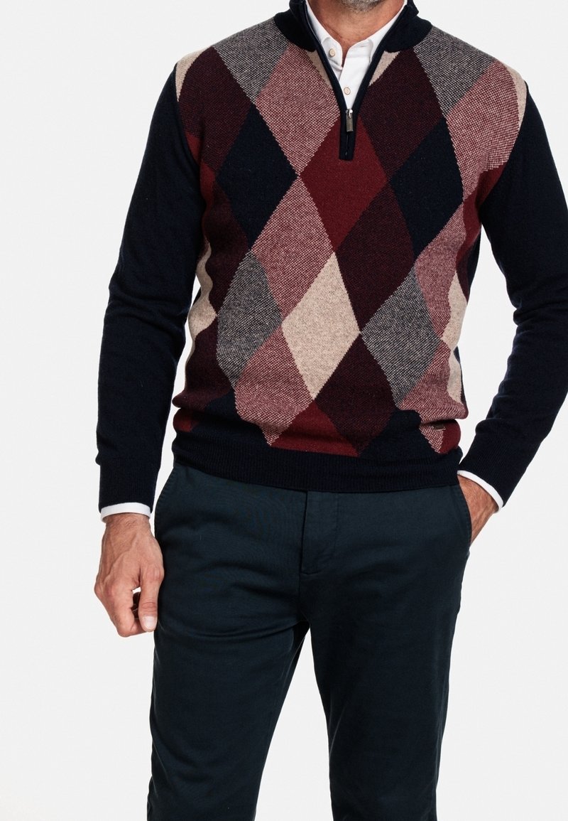 Czarna bluza na zamek z wzorem argyle w kolorze burgundowym, szarym i kremowym. Dzianinowa tekstura z ściągaczami przy rękawach i u dołu.