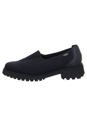 Zapatos negros sin cordones con puntera redondeada, suela de goma con taqueado y parte superior de sintético liso. Presenta un acento texturizado en el talón trasero y una marca mínima.