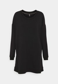 Černá mikina s dlouhým rukávem a kulatým výstřihem, se bočními rozparky a žebrovanými manžetami. Vyrobena z měkké tkaniny s hladkou texturou.