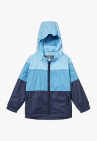 Modrý a námořnický větrový kabát s kapucí, design bloků barev, přední zip, elastické manžety a dvě boční kapsy. Texturovaná tkanina.