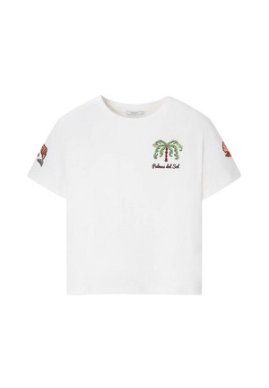T-shirt blanc à manches courtes avec un palmier vert brodé et le texte "Palmas del Sol" sur la poitrine, avec des motifs de poissons rouges sur les deux manches.