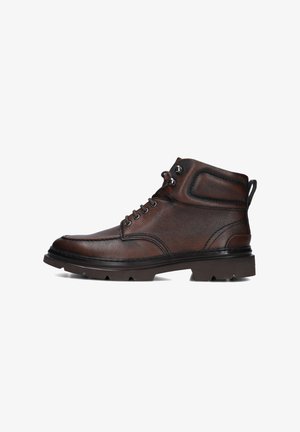 Braune Leder-Ankle Boots mit strukturierten Oberflächen, runder Zehenpartie, Schnürung, verstärktem Knöchelbereich und robustem Gummisohle.