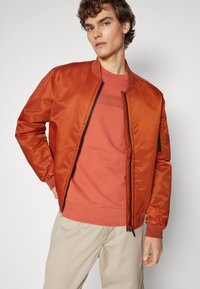 Calvin Klein HERO  - Bomberjacks - terracotta rust