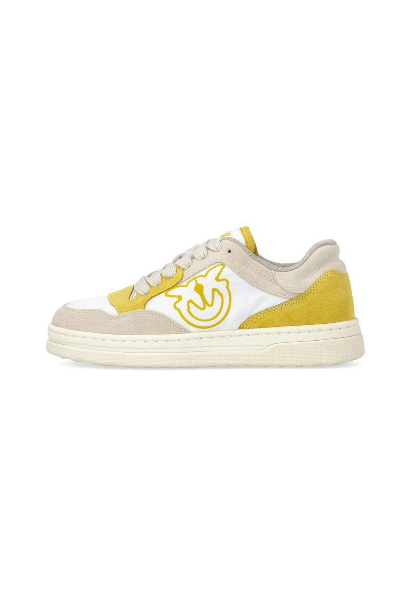 Sneakers featuring a white leather base with yellow suede accents, grey suede detailing, and a yellow logo on the side. Flat rubber sole.