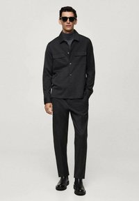 Mango Chino - mottled dark grey