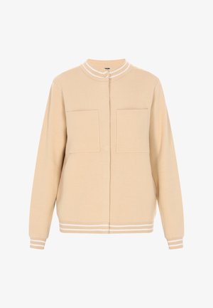 Beige cardigan made from knit material, featuring a collar, two chest pockets, and white striped accents on the collar and cuffs.