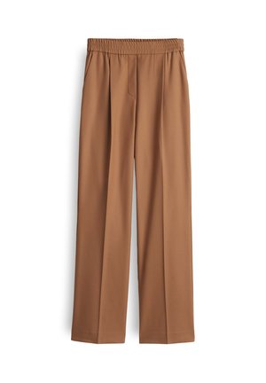 Pantaloni larghi marroni realizzati in tessuto morbido, con una vita elastica e tasche anteriori, caratterizzati da un design pulito e senza chiusure visibili.