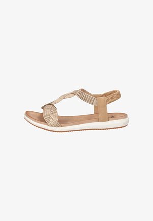 Sandalo beige con punta aperta, cinturini intrecciati, plantare imbottito, cinturino elastico al tallone e suola in gomma bianca.