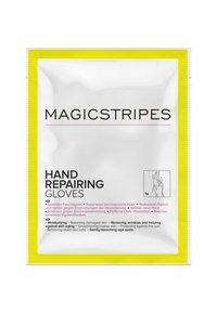 Busta bianca con bordo giallo, etichettata "GUANTI RIPARATIVI MAGICSTRIPES." Contiene dettagli del prodotto in inglese e tedesco, con illustrazioni di mani.