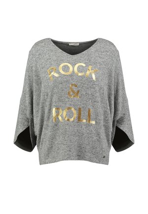 - Sweter
