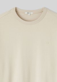 Non sélectionné, blanc cassé