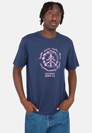 Navy blue cotton t-shirt featuring a pink graphic of a tree and circles, with short sleeves and a relaxed fit.