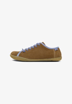 Brown suede sneaker with light blue laces and trim, featuring a flexible rubber sole and a simple, casual design. Side view displayed.