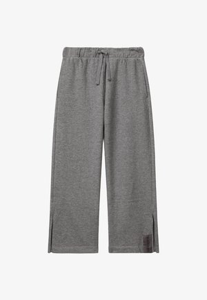 Gray wide-leg sweatpants with elastic waistband, drawstring, side pockets, small side slits, and "DREAM" tag near hem.