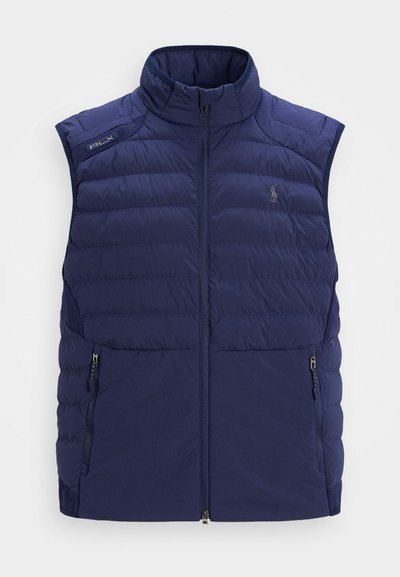 Navy blue quilted sleeveless vest with stand collar, front zipper, zippered side pockets, and embroidered logo on chest.