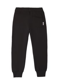 Schwarze Jogginghosen aus weichem Material, mit verstellbarem Bund, schmal zulaufenden Beinen und einer Gesäßtasche auf der rechten Seite.