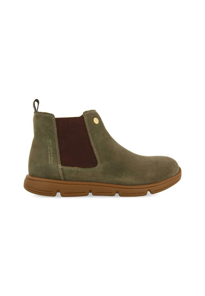 Stivale alla caviglia verde in pelle con pannello elastico laterale marrone, linguetta e suola in gomma dotata di scanalature per una buona aderenza. Dettagli cuciti sulla parte superiore.