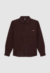 Checkered long-sleeve shirt in dark red and black. Features a button-down collar, chest pocket, and black buttons on a soft fabric.