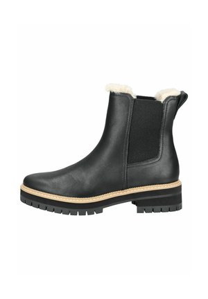 Botte de chelsea en cuir noir avec un intérieur en fausse fourrure douce, des panneaux latéraux élastiques et une semelle en caoutchouc épaisse avec un motif texturé pour une meilleure adhérence.