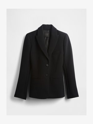 Juodas švarkas su įpjauta atlapu, dviem sagomis ir viena krūtinės kišene. Pagamintas iš lygaus audinio, turi struktūruotą kirpimą ir ilgomis rankovėmis.