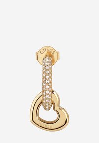 Orecchino a forma di cuore in tonalità oro con finitura liscia e levigata e una fila di strass trasparenti scintillanti lungo la parte superiore. Logo inciso.