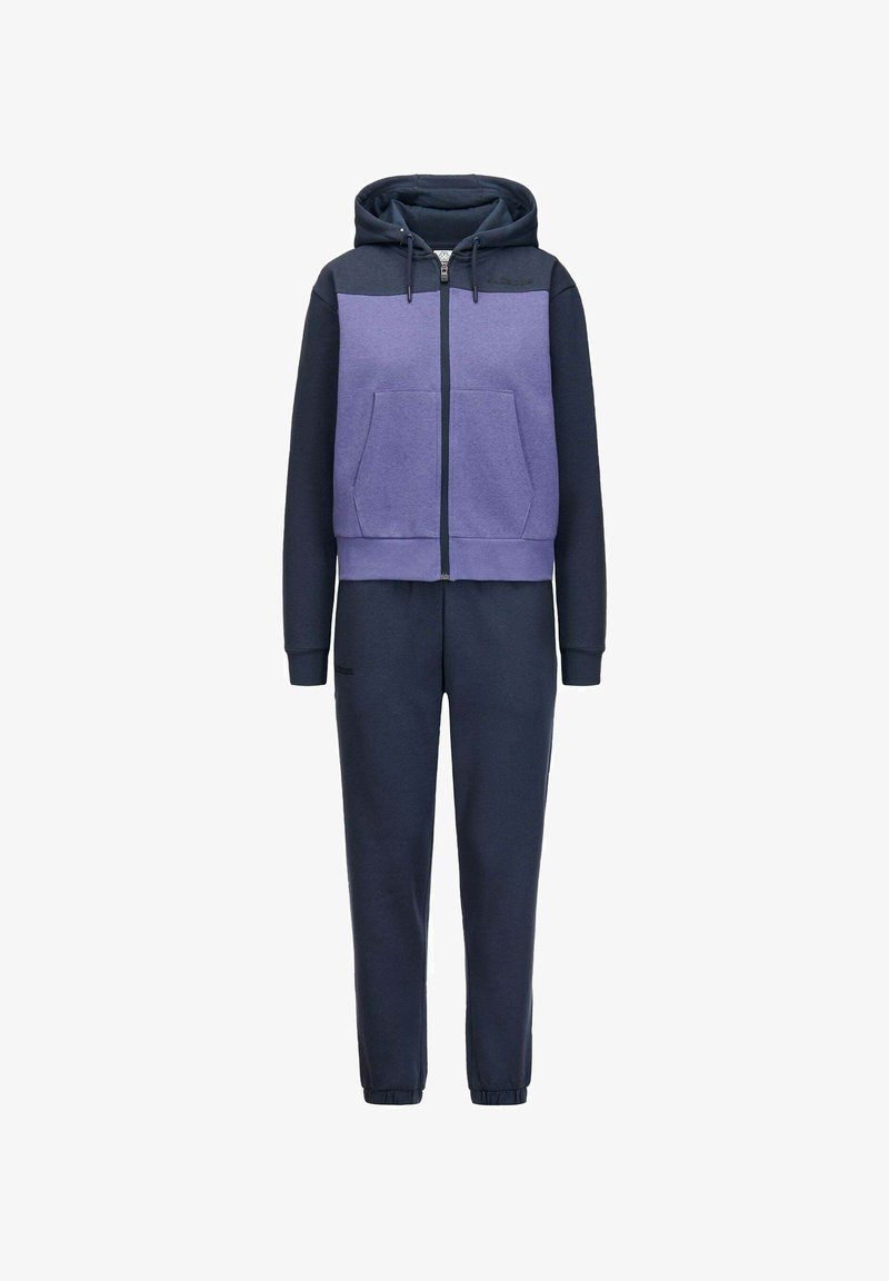 Felpa con cappuccio viola e blu navy con zip, tasca a marsupio e coulisse sul cappuccio, abbinata a pantaloni jogger blu navy coordinati. Tessuto in misto cotone.
