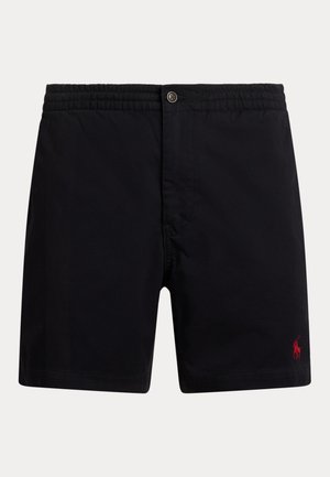 Bañador negro con cintura elástica, cierre de botón y un pequeño logo rojo en la parte inferior del lado izquierdo. Tejido suave con corte clásico.