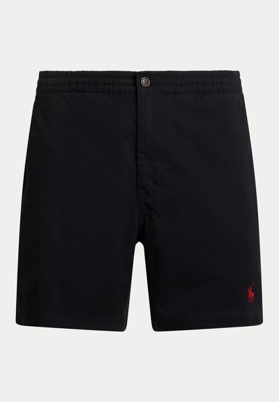 Melnas peldšortas ar elastīgu jostasvietu, pogu aizdari un mazu sarkanu logotipu kreisajā apakšējā kājā. Gluda auduma ar klasisku griezumu.