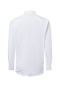 Camicia bianca a maniche lunghe, con colletto a punta, tessuto texturizzato, polsini con un bottone, dettaglio dello yoke posteriore e orlo svasato.