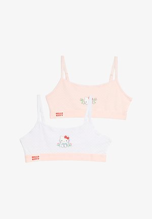 Dwa krótkie topy Hello Kitty dla dziewczynek, jeden jasnoróżowy i jeden biały, oba w drobne kropki z grafiką Hello Kitty z przodu.