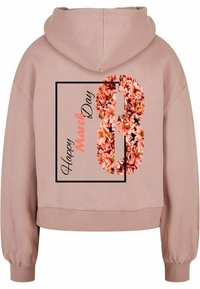 Pink cropped hoodie featuring a floral design with the number "8" and the text "Happy March Day" inside a black rectangular outline.
