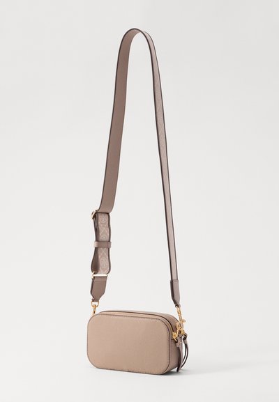 Beige leather crossbody bag with a rectangular shape, zip closure, and a gold-tone hardware accent. Adjustable strap with repeated logo pattern.