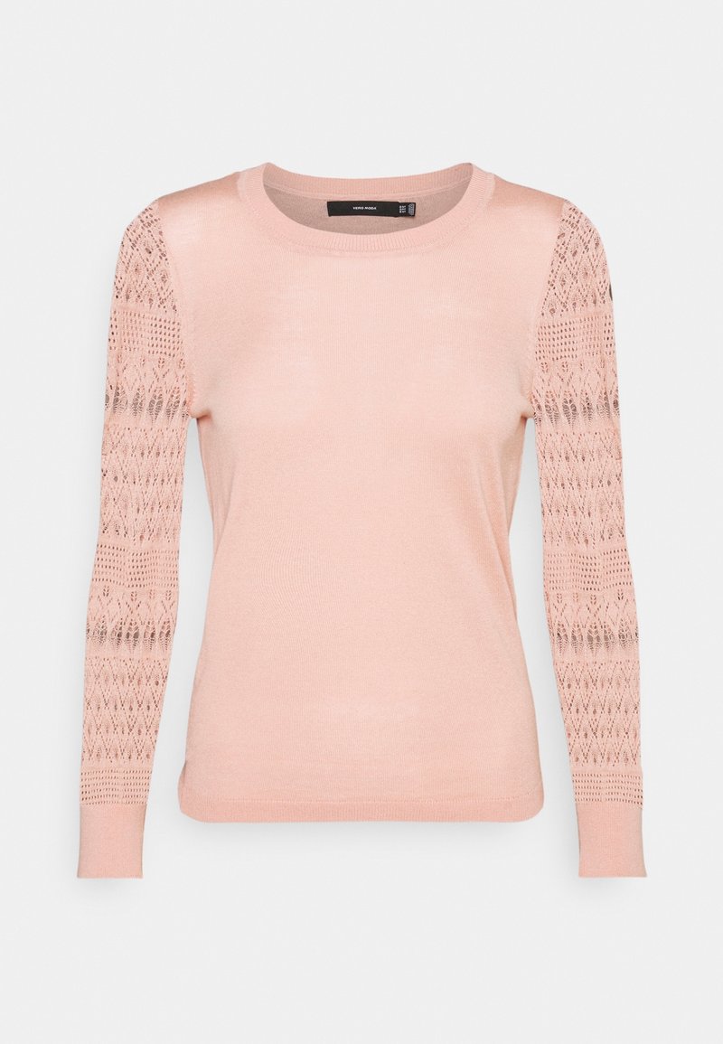 Light pink long-sleeve knit top with round neckline and lace-patterned sheer sleeves, fitted body, and ribbed cuffs.