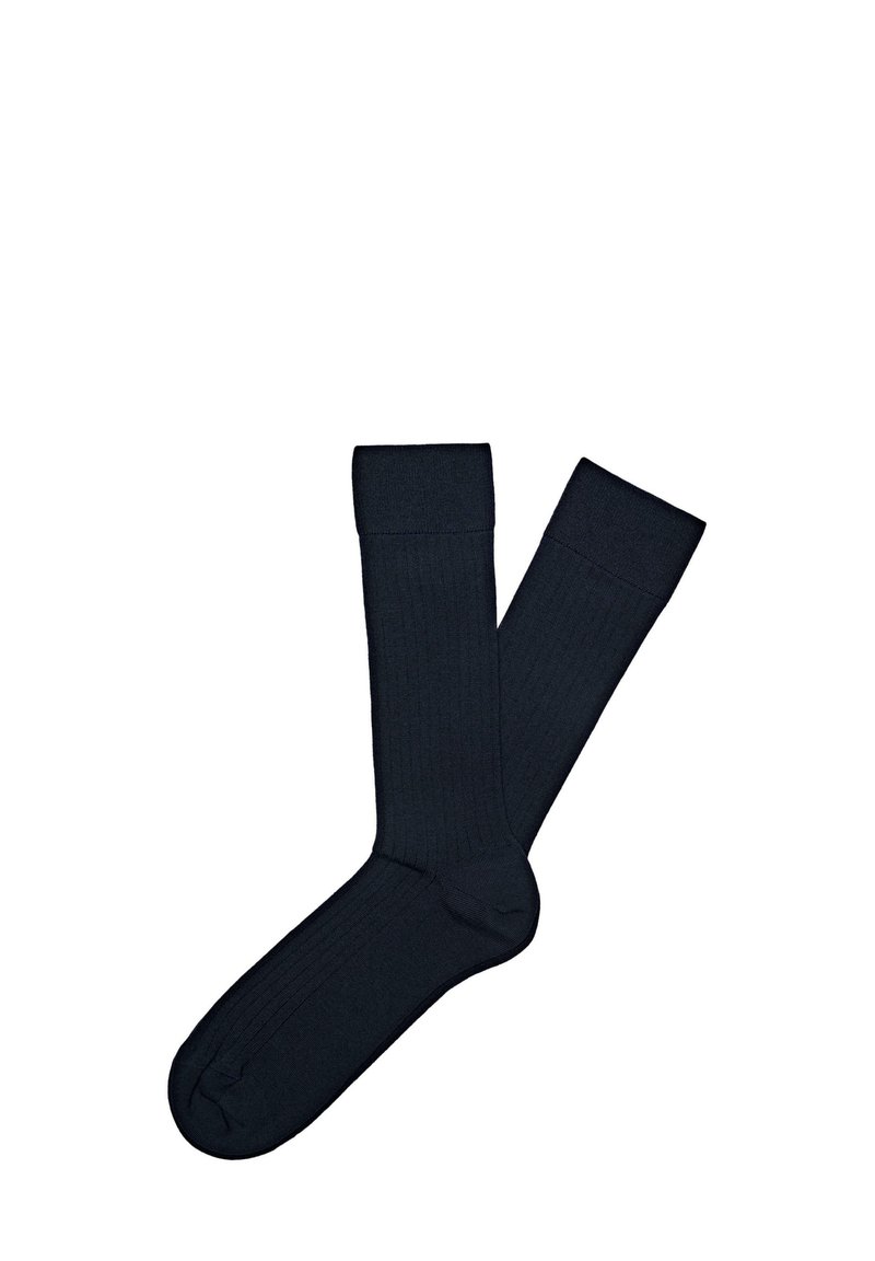 Mörk marinblå ribbade strumpor med en slät yta och en design i ankellängd. Har en förstärkt tå och ett bekvämt band upptill.