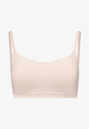 Sutiã bege sem costuras com decote redondo, alças largas, textura suave e sem aros. Apresenta copas lisas para conforto e suporte.
