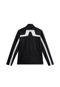 Black jacket featuring a textured pattern, high collar, long sleeves, and white accents on the shoulders and back.