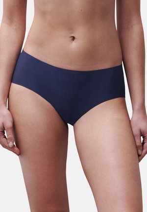 Slip bikini blu navy con una texture liscia ed elastica. Presentano un taglio classico con vita media e bordi laterali senza cuciture.