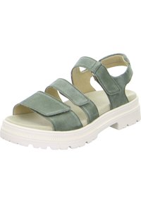 Zelené semišové sandály s třemi nastavitelnými pásky na suchý zip, polstrovanou stélkou a bílou gumovou podrážkou s texturovaným vzorem.