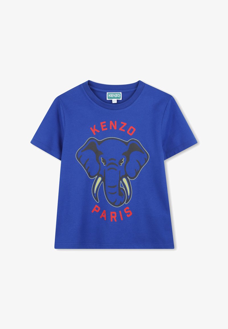 T-shirt en coton bleu avec une illustration de tête d'éléphant, avec "KENZO" au-dessus et "PARIS" en dessous en texte rouge. Manches courtes et col rond.